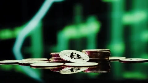 Crypto currency Bitcoin extreme close up stock footage. Golden BTC coins.  Stock Footage 253577105