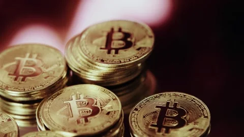 Crypto currency Bitcoin extreme close up stock footage. Golden BTC coins.  Stock Footage 253577935