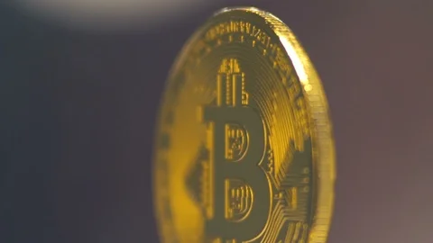 Crypto currency, bitcoin gently rotates on a red blinking background. BTC, Bit Stock Footage 88614860