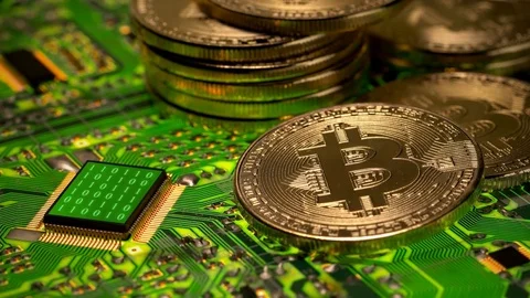 Crypto-currency bitcoin,with the processor of the computing algorithms on the Stock-Footage 82932872