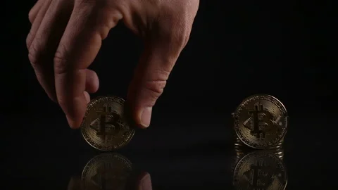 Crypto currency coin rotating, Bitcoin on black background Video stock 85470607