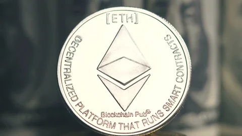 Crypto currency Ethereum. ETH shoot close up. Ethereum on dollars background Stock Footage 88858170