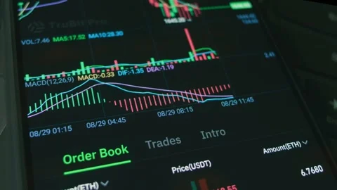 Crypto data on a mobile phone screen. Cryptocurrency concept. Market pricing Stock Footage 250074773