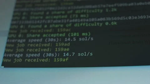 Crypto miner program window showing the process of mining cryptocurrency. Mining Stock Footage 149847526