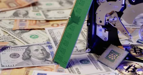 Crypto Mining concept. Bitcoin reflecting on HDD platter on top of Euro Stock Footage 154056200