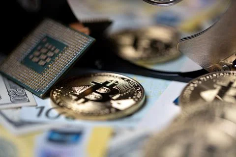 Crypto mining concept, bitcoin reflecting in hard drive disk next to US Dollar Stock-Fotos