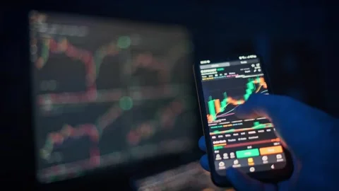 Crypto Trading on Mobile Phone Stock Footage 303864684