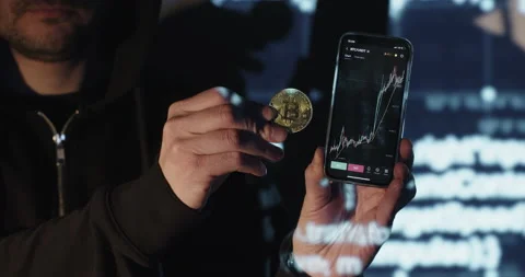 Crypto trading on smartphone Stock Footage 174718187