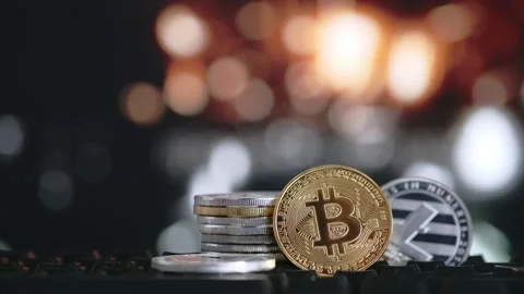 Cryptocurrency bitcoin and litecoin on blurred dynamic abstract bright Stock Footage 162948779