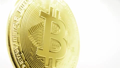 Cryptocurrency, Bitcoin (BTC). Macro shot of a Bitcoin. Smooth motion Stock Footage 302203752