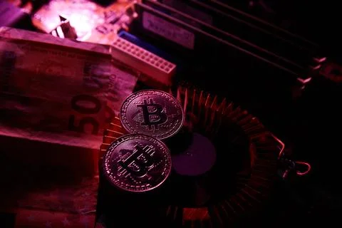 Cryptocurrency, bitcoin on a chip, blockchain Stock Photos