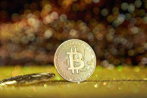 Cryptocurrency bitcoin is the coin of the future. Golden Bitcoin. Gold shiny Stock Photos