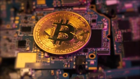 Cryptocurrency bitcoin on integrated circuit board close up Stock Footage 270453259