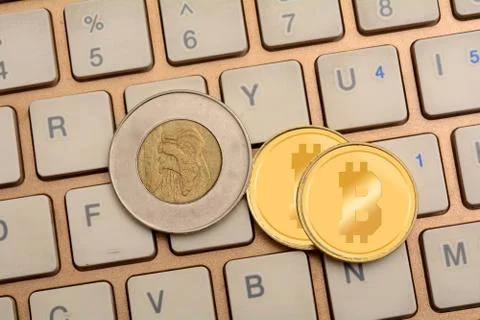 Cryptocurrency Bitcoin on Keyboard close up Stock Photos