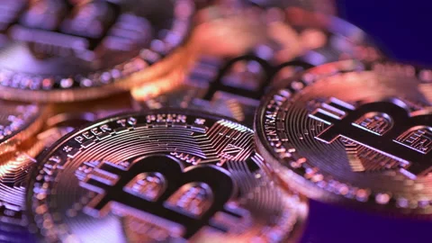 Cryptocurrency Bitcoin motion shot Stock Footage 189787079