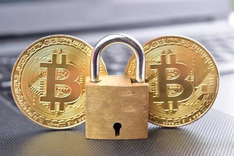 Cryptocurrency bitcoin , payment security concept , golden bitcoin with padlo Stock Photos