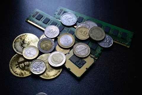 Cryptocurrency coins with computer processor and memory modules technology 写真素材