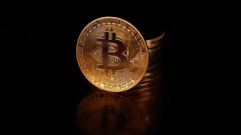 Cryptocurrency Coins in Minimal Dark Scene Stock Footage 339568899