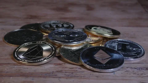 Cryptocurrency coins in sharp focus Stock Footage 295030400