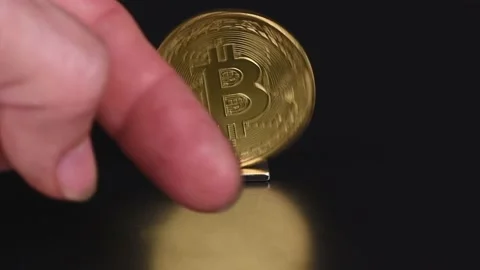 Cryptocurrency exchange rate concept. The reverse side of the Bitcoin Stock Footage 237862015