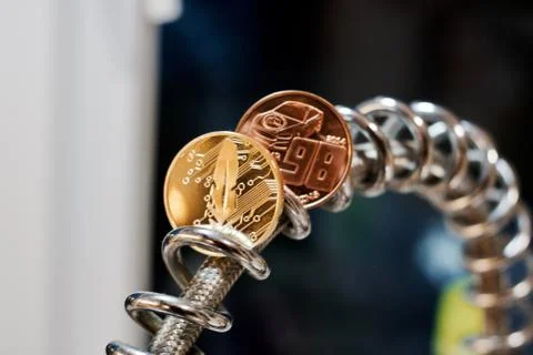 Cryptocurrency feather coin Stock Photos