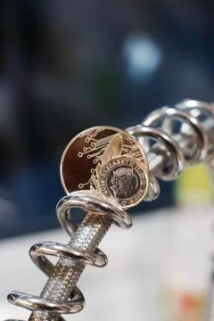 Cryptocurrency feather coin Stock Photos