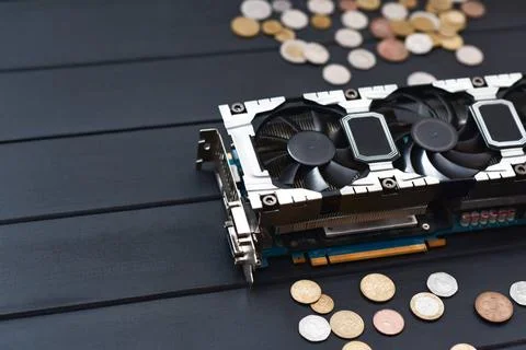 Cryptocurrency mining concept with bitcoins on a computer videocard Crypto... Fotos de archivo