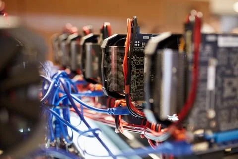 Cryptocurrency mining equipment - lots of gpu cards on mainboard Stock Photos