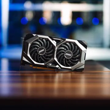 Cryptocurrency mining GPU rig computer graphics card on the table, close-up Stock Photos
