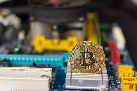 Cryptocurrency mining with the help of computer technology Stock Photos