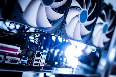 Cryptocurrency mining machine in a close-up shot. Stock Photos
