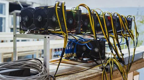 Cryptocurrency mining rig. Close up of array of GPUs for mining rig machine to Stock Photos