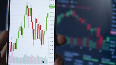Cryptocurrency price and graph evolution. Stock Photos
