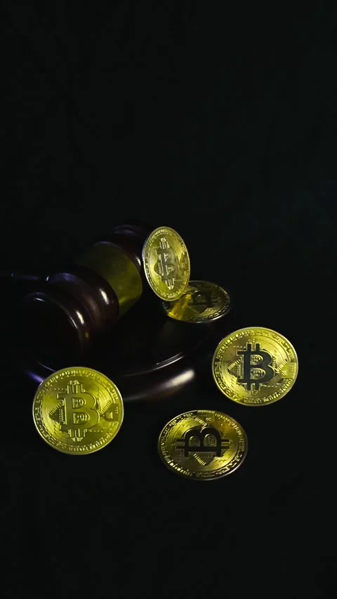 Cryptocurrency Regulation Concept with Bitcoin and Judge Gavel Stock Footage 337429277