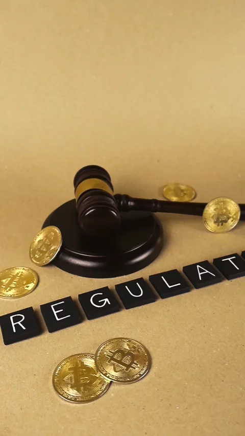 Cryptocurrency regulation concept with bitcoin and gavel Stock Footage 342528702