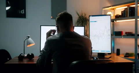 Cryptocurrency trader frustrated over big loss, behind the back tracking sho Stock-Footage 160975041