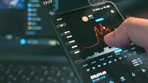 Cryptocurrency trading chart. Investor checking Bitcoin and other altcoin Stock Footage 249876122