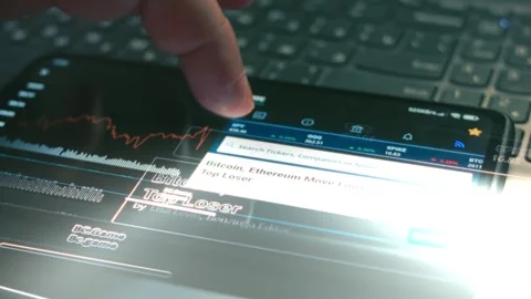 Cryptocurrency trading chart. Investor checking Bitcoin price index and Stock Footage 249877310