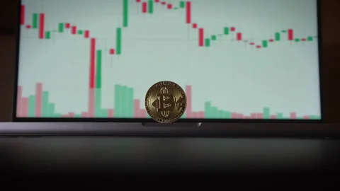 Cryptocurrency Trading Visualization with a Gold Coin representation and 스톡 동영상 296019695