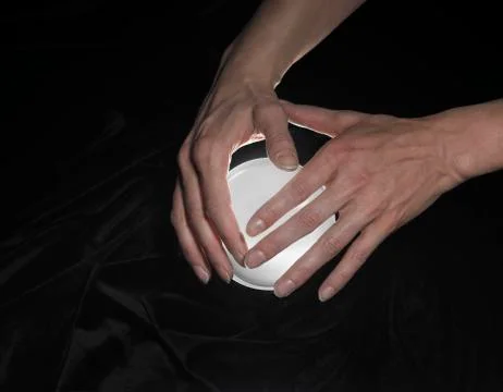 Crystal ball and hands around Stock Photos