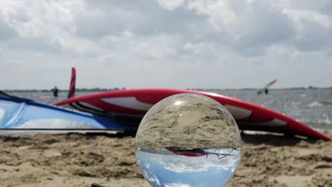 Crystal ball on the beach Video stock 253700926