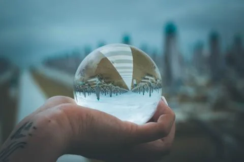 Crystal ball on the beach Stock Photos