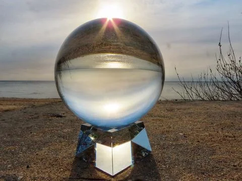 Crystal ball on beach Stock Photos