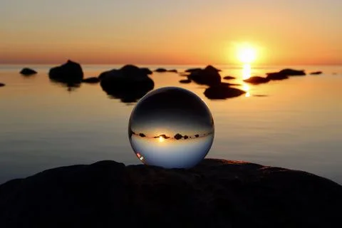 Crystal ball on boulder Stock Photos