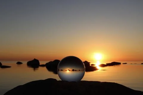 Crystal ball on boulder Stock Photos