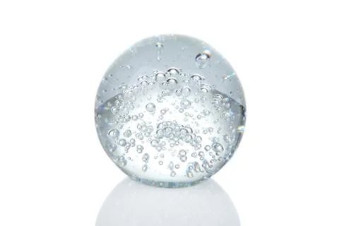 Crystal ball with bubbles and reflection isolated on white Foto stock