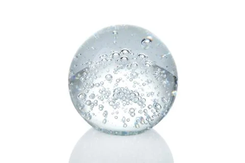 Crystal ball with bubbles and reflection isolated on white Stock Photos