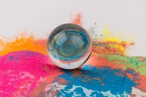 Crystal ball on colour background, space for text. Stock Photos