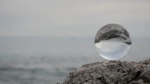 Crystal ball on sea Stock Footage 63684133