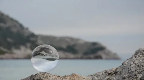 Crystal ball on sea Stock Footage 63684903